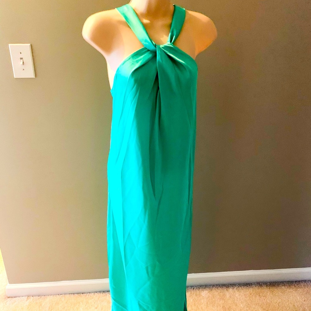 Beautiful Polyester light weight Dress that can be worn just about anywhere.